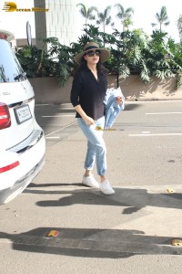 actress Preity Zinta in black shirt and blue denim jeans