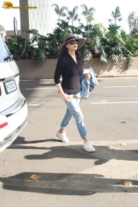 actress Preity Zinta in black shirt and blue denim jeans