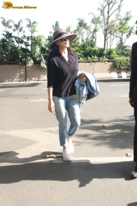 actress Preity Zinta in black shirt and blue denim jeans