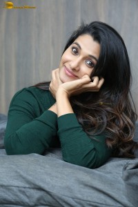 actress priya bhavani shankar in a green top and denim jeans