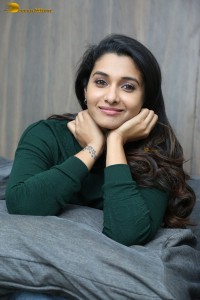 actress priya bhavani shankar in a green top and denim jeans
