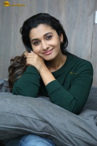 actress priya bhavani shankar in a green top and denim jeans