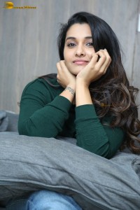 actress priya bhavani shankar in a green top and denim jeans