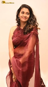 actress priya bhavani shankar in a brick red saree
