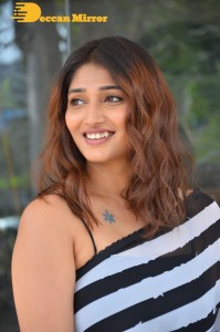 Priya Vadlamani in a black and white saree