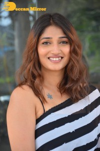 Priya Vadlamani in a black and white saree