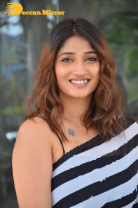 Priya Vadlamani in a black and white saree