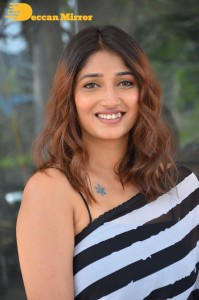 Priya Vadlamani in a black and white saree