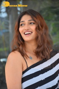 Priya Vadlamani in a black and white saree