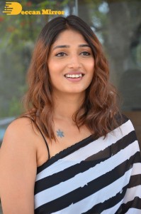 Priya Vadlamani in a black and white saree