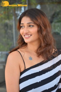 Priya Vadlamani in a black and white saree