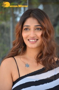 Priya Vadlamani in a black and white saree