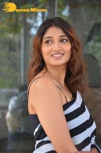 Priya Vadlamani in a black and white saree