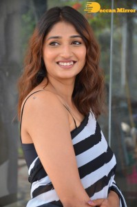 Priya Vadlamani in a black and white saree