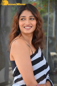 Priya Vadlamani in a black and white saree