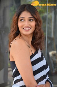 Priya Vadlamani in a black and white saree