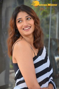 Priya Vadlamani in a black and white saree