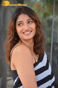 Priya Vadlamani in a black and white saree