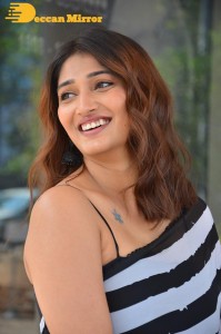 Priya Vadlamani in a black and white saree