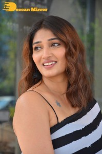 Priya Vadlamani in a black and white saree