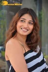 Priya Vadlamani in a black and white saree