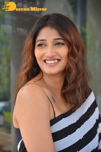 Priya Vadlamani in a black and white saree