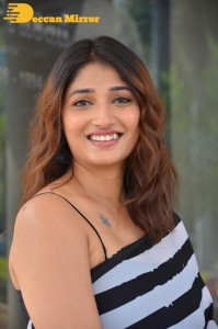 Priya Vadlamani in a black and white saree