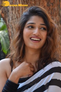 Priya Vadlamani in a black and white saree