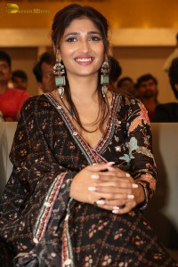 Actress Priya Vadlamani in a colorful black dress