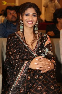 Actress Priya Vadlamani in a colorful black dress