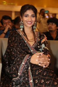 Actress Priya Vadlamani in a colorful black dress