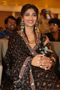 Actress Priya Vadlamani in a colorful black dress