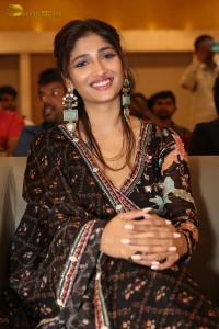 Actress Priya Vadlamani in a colorful black dress