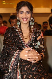 Actress Priya Vadlamani in a colorful black dress