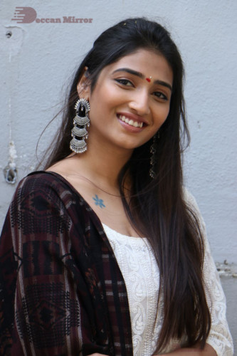 Telugu Actress Priya Vadlamani in a white salwar dress