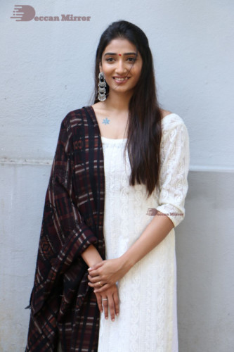 Telugu Actress Priya Vadlamani in a white salwar dress