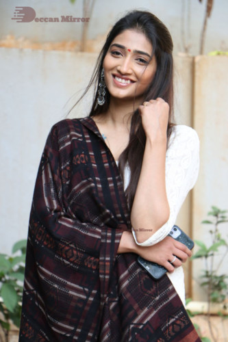 Telugu Actress Priya Vadlamani in a white salwar dress