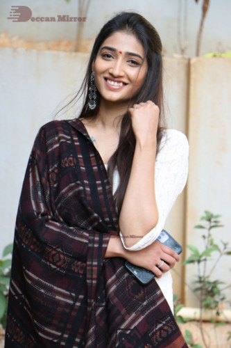 Telugu Actress Priya Vadlamani in a white salwar dress