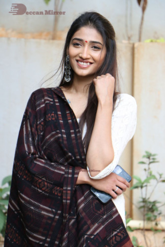 Telugu Actress Priya Vadlamani in a white salwar dress