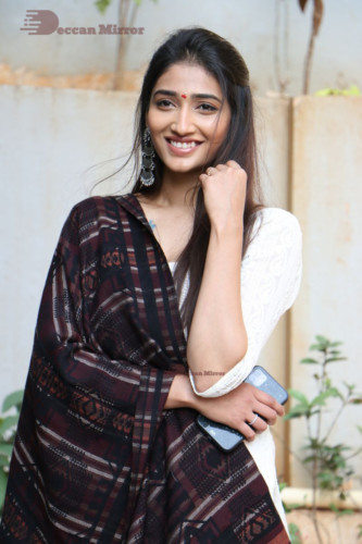 Telugu Actress Priya Vadlamani in a white salwar dress