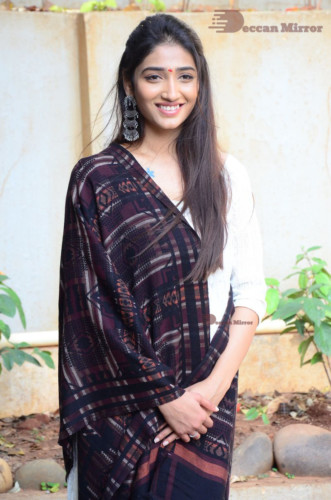 Telugu Actress Priya Vadlamani in a white salwar dress