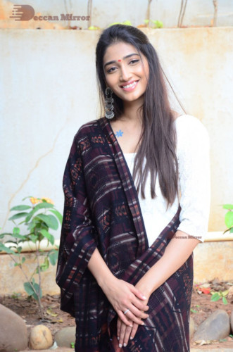 Telugu Actress Priya Vadlamani in a white salwar dress