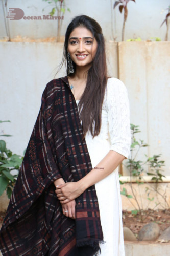 Telugu Actress Priya Vadlamani in a white salwar dress