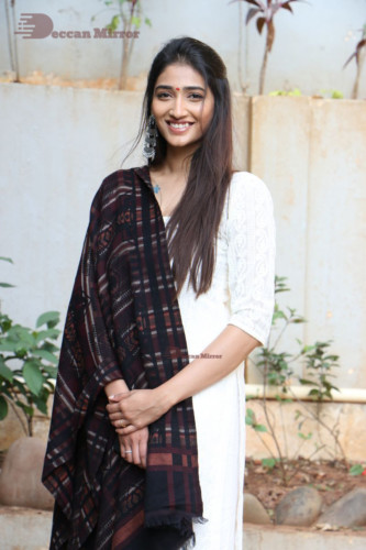 Telugu Actress Priya Vadlamani in a white salwar dress