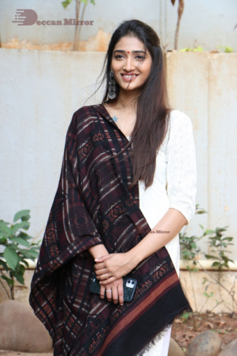 Telugu Actress Priya Vadlamani in a white salwar dress