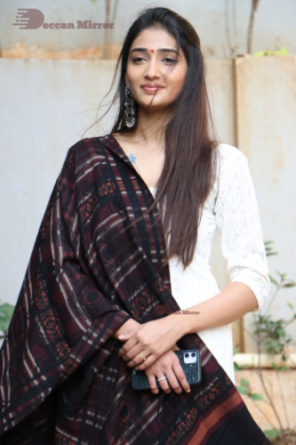 Telugu Actress Priya Vadlamani in a white salwar dress