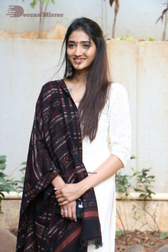 Telugu Actress Priya Vadlamani in a white salwar dress