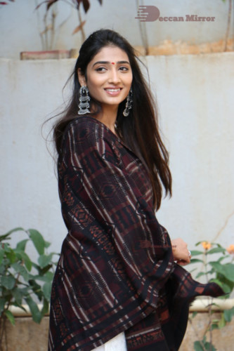 Telugu Actress Priya Vadlamani in a white salwar dress