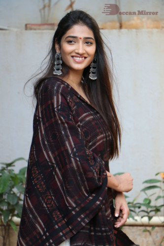 Telugu Actress Priya Vadlamani in a white salwar dress