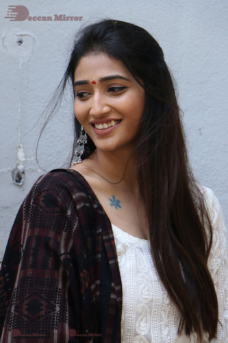 Telugu Actress Priya Vadlamani in a white salwar dress